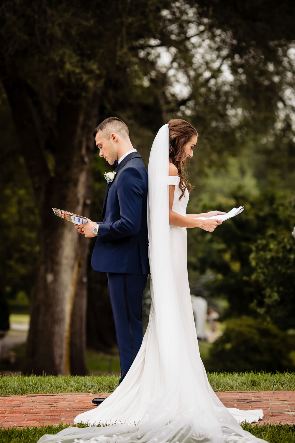 Bride and groom reading their vows to each other